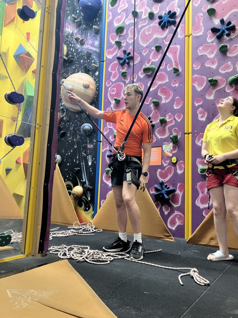 Dylan instructing a climbing session